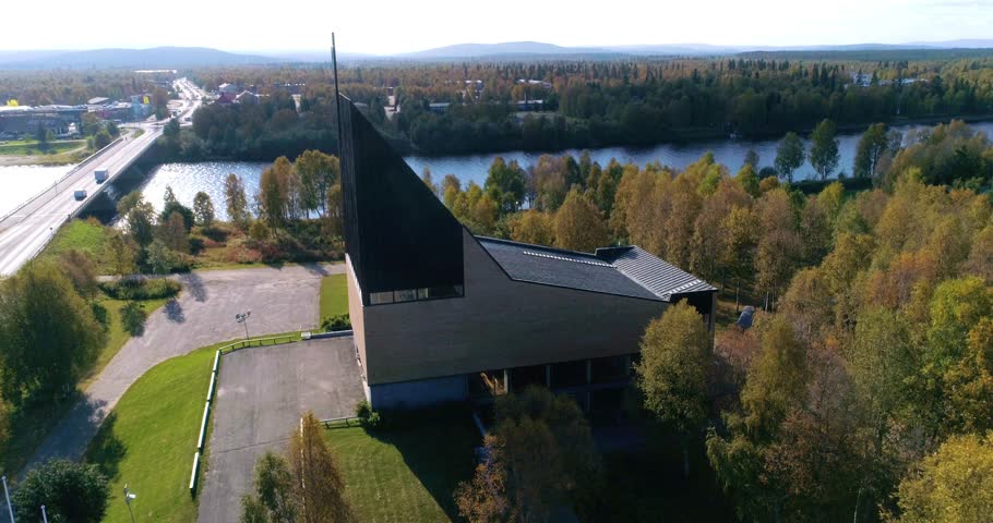 Arctic church, Cinema 4k aerial decreasing tilt view of a church, in Ivalo town, on a sunny autumn day, in Lapland, Lappi, Finland