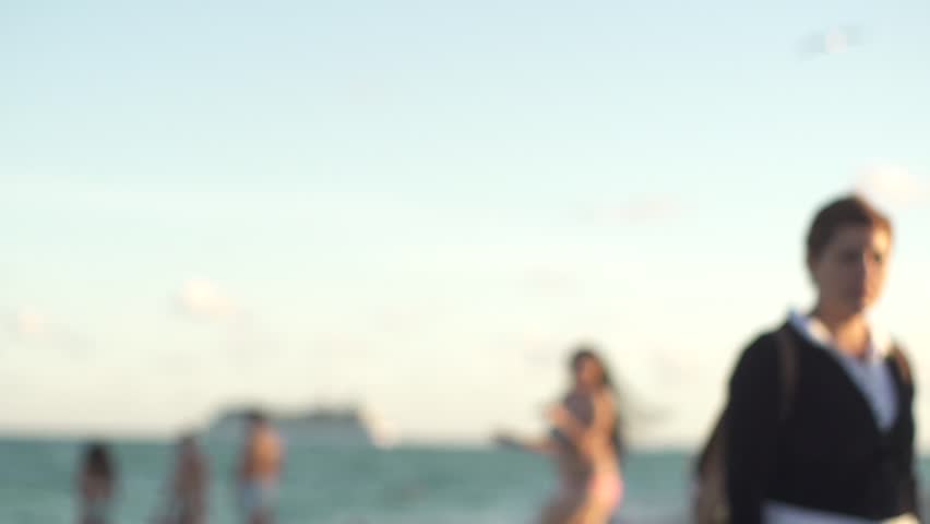 Tourists relaxing on a sunny day Miami Beach South Beach summer
