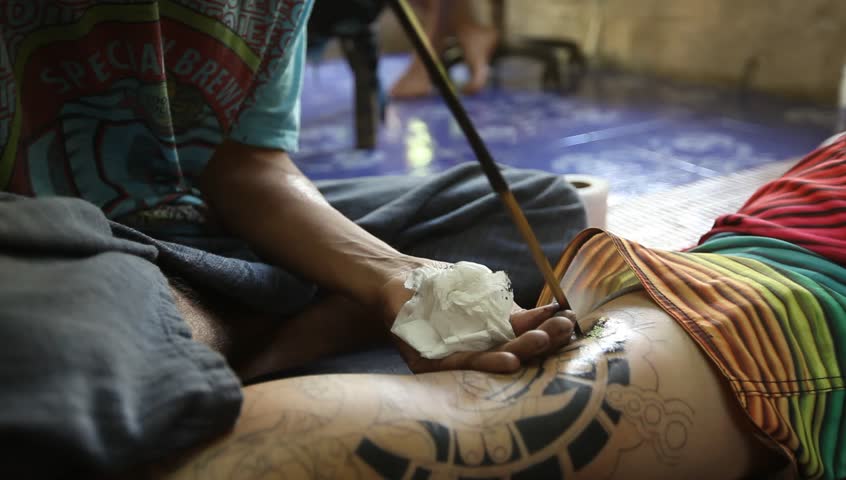 CHANG, THAILAND - DEC 24: Unidentified master makes traditional tattoo bamboo,