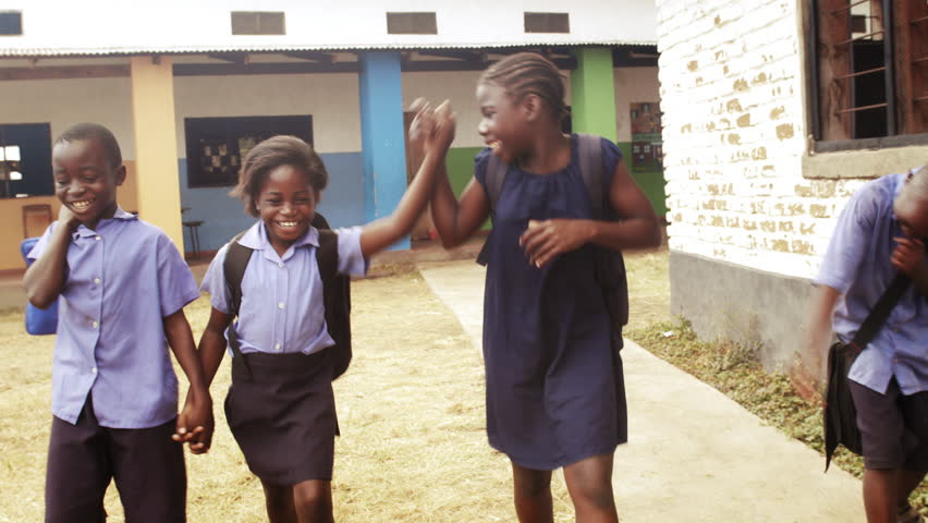 4k Group of African school children / pupils walking to class with backpacks. Royalty-Free Stock Footage #33161050