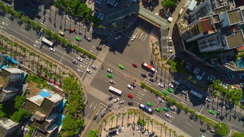 sunny day zhuhai city center traffic street crossroad aerial down view 4k time lapse china
