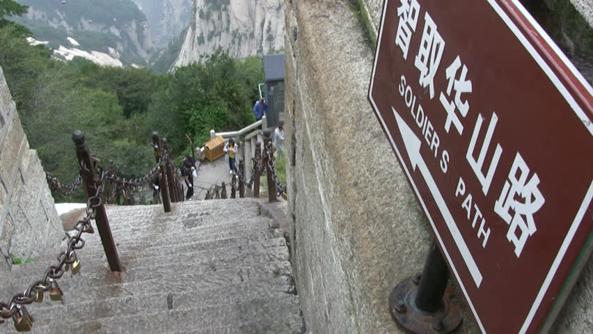 Hua Shan , province Shaanxi close by county town Huayin ( China ) July 2012. Sign for Soldiers path. 