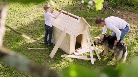 Father and son carpenter in slow motion