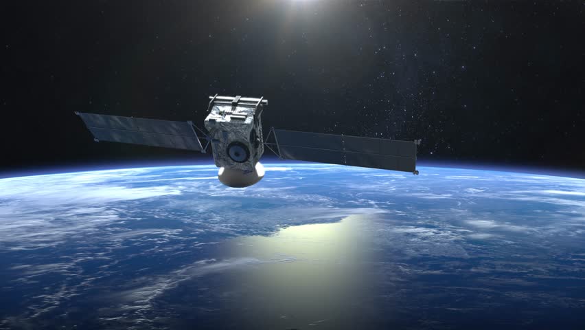 The satellite scan and monitor the Earth. The camera shoots the satellite close-up. The earth rotates slowly. 4K.
