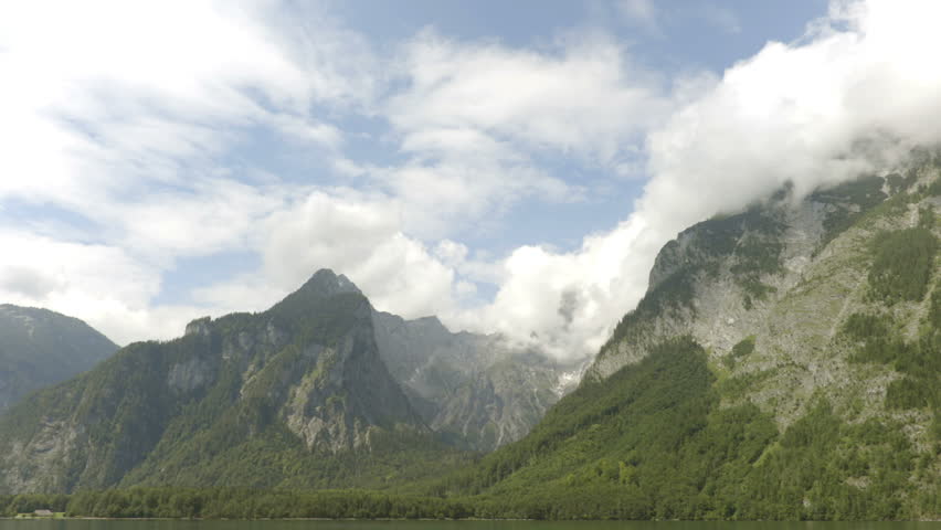 Camera move along the canyon on the cloudy sky background