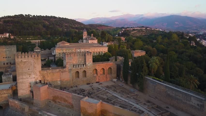 Ancient medieval castle The Alhambra in Granada at spring sunny clear ...