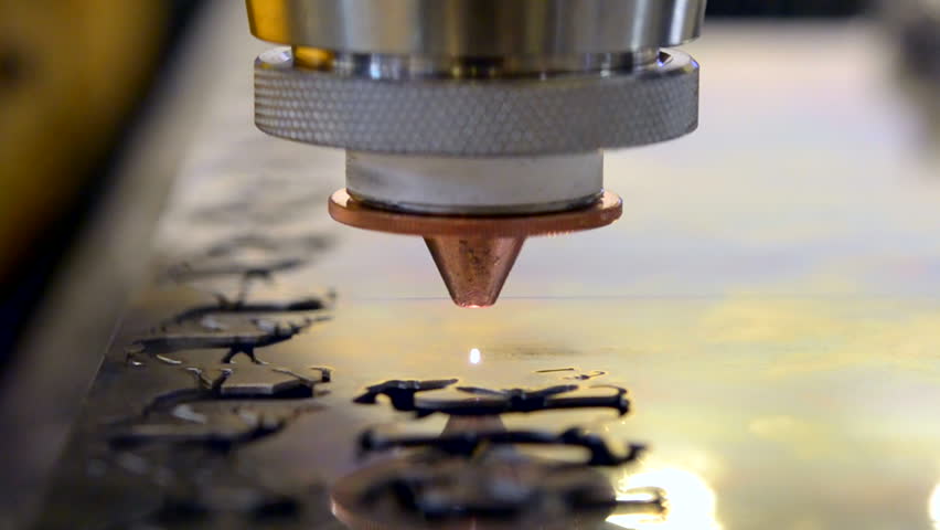 Fiber laser machines for metal cutting close-up. A laser beam cuts the sheet metal in the manufacture. Industrial technologies, production processes Royalty-Free Stock Footage #33194431