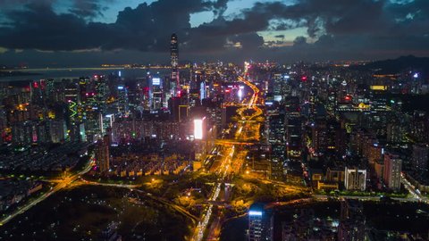 sunset night illuminated famous shenzhen city traffic road junction aerial panorama 4k time lapse china