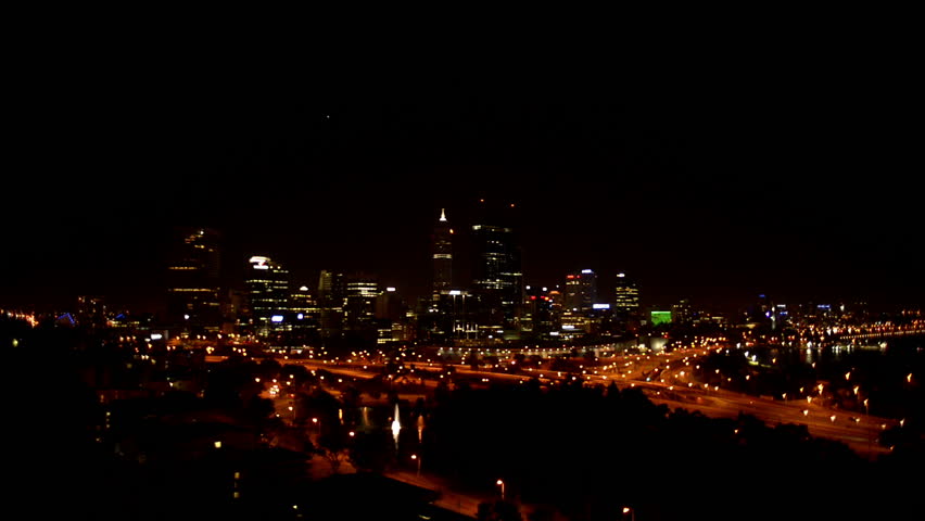 The lights of Perth City and the freeway at night, as seen from King's Park.