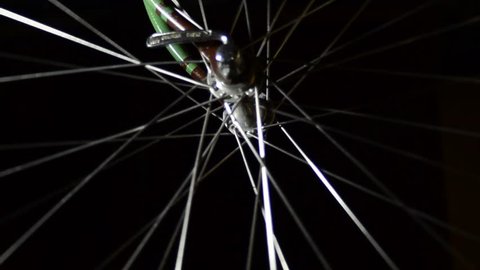 bycicle spokes on black background