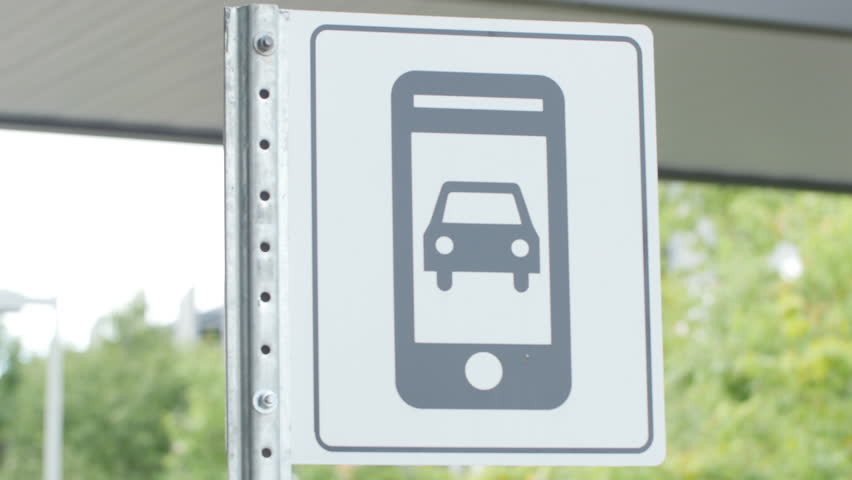 Ride sharing pickup sign location at airport