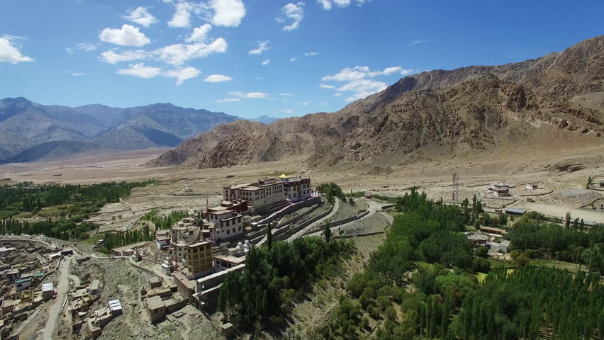Buddhist Monastery / 360 Aerial view of Buddhist Monastery in a beautiful valley, flying over a Buddhist Monastery. Himalaya, Ladakh, Drone. 