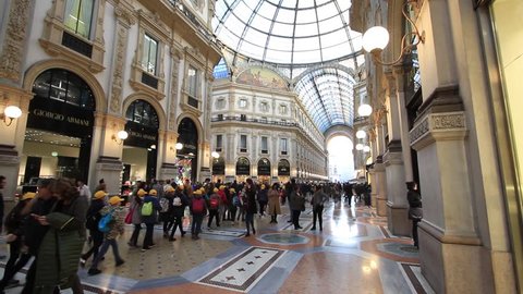 Milan, November 2017: People Walking In Gallery Vittorio Emanuele II, the shopping mall in Milano, the fashion and design capital of the world, on November 2017 in Milan, Italy