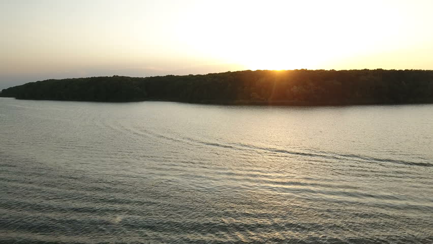 Aerial view of a lake with summer sky
