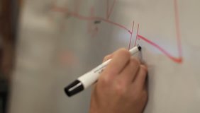 Writing formula on whiteboard  - Powered by Shutterstock - Get 15% off with code: PIKWIZARD15