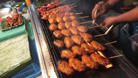 Grilling Chicken Wings On Sticks : Chiang Mai Street Food , Thailand