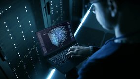 Data Center IT Engineer Holds Laptop and Works on the Neural Network AI Project. Shot on RED EPIC-W 8K Helium Cinema Camera. - Powered by Shutterstock - Get 15% off with code: PIKWIZARD15