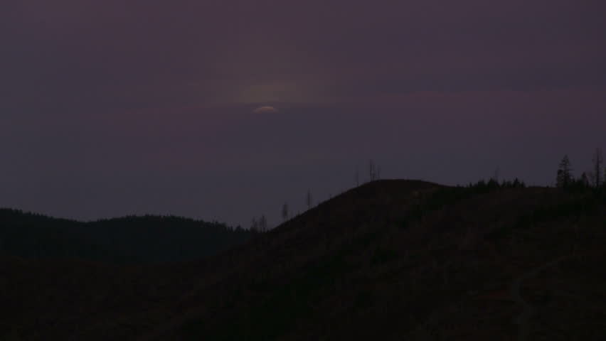 Moonrise silhouette time lapse