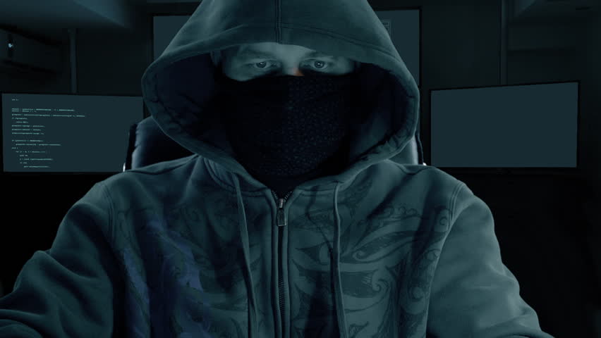 Male hacker sits in front of virtual screen in monitor room and do IP tracing via satellite uplink. Dark night low key film look. Royalty-Free Stock Footage #33261973