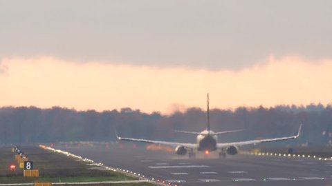 4k passenger airplane taking off from the runway.