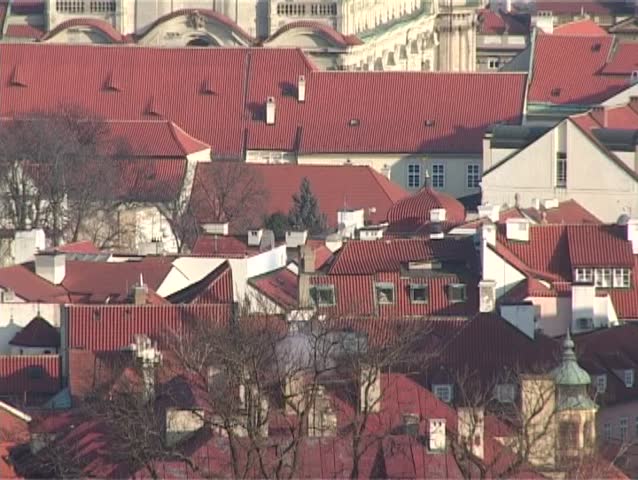 Prague panorama in winter with Prague castle, Little quarter and Old town. Panning right to left, zoom out.