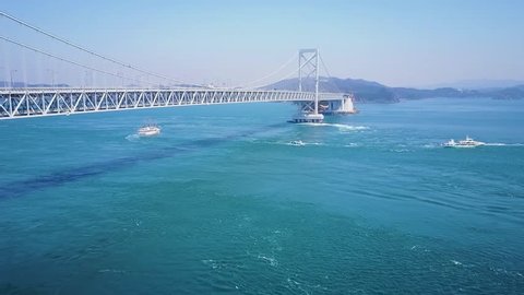 Naruto Bridge, Sight Seeing Boats And Cars Crossing Naruto Strait 