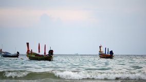 Travel Video In the high season.Long-tail boats converted boat excursions. In order to serve tourists cruising the island.The Andaman Sea coast. in travel and transportation concept