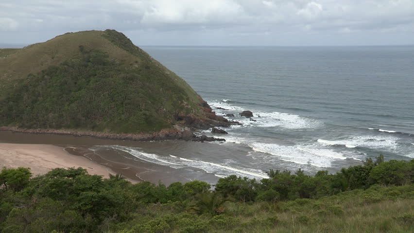 Wide pan of Manteku beach and estuary of the Ntafufu River  on the Transkei Wild