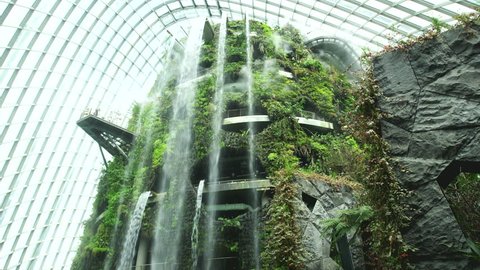 SINGAPORE - FEBRUARY 28, 2013: waterfall in the cloud forest, gardens by the bay