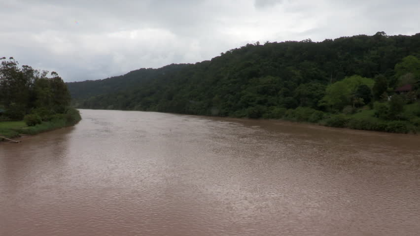 View of the Umzimvubu River with thick natural vegetation on either side of the