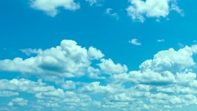 White clouds & blue sky time lapse, rolling clouds fast motion. summer sky time lapse, sun shining and moving clouds, airplane passing by, White Cloud & Blue Sky, Flight over clouds, loop-able. FHD.