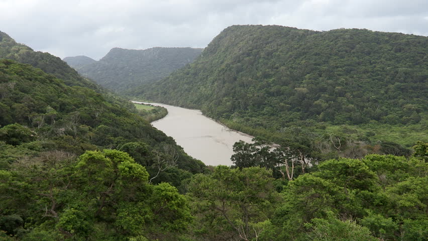 Wide inland view of the Ntafufu River near Manteku camp in the Transkei.