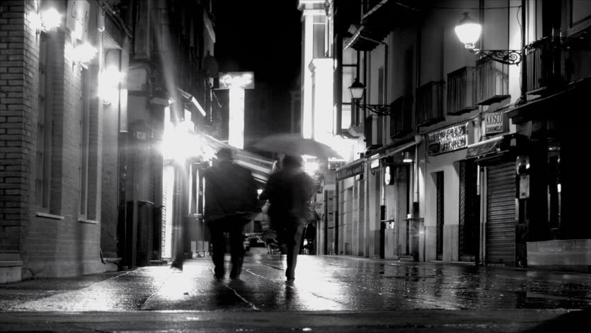MADRID, SPAIN - CIRCA 2013. Black and white time lapse of people walking in the