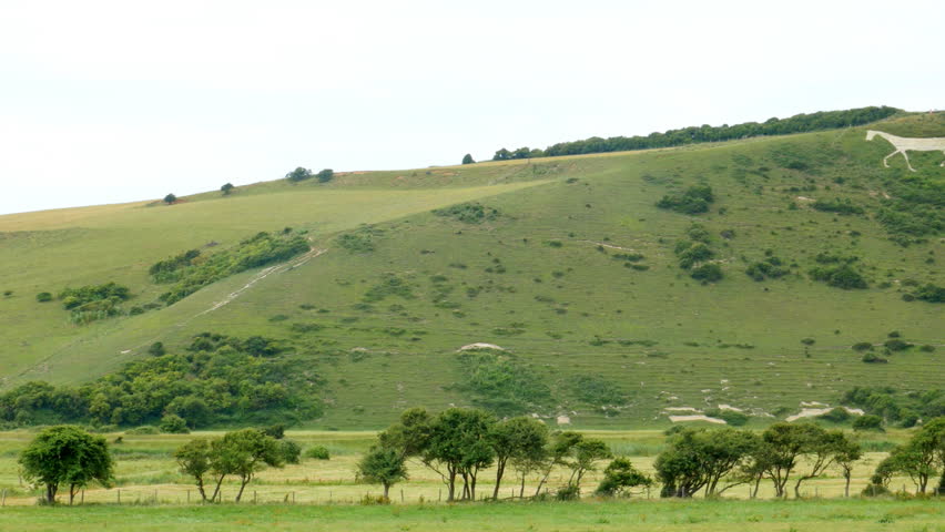 White Horse giant hill figure, High and Over, South Downs, East Sussex, England - camera pan
