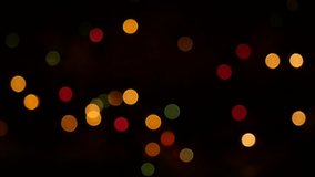 Colorful blurry lights flashing on black background. 1920x1080, full hd