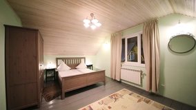Bedroom with double bed, wardrobe, TV and wooden ceiling - Powered by Shutterstock - Get 15% off with code: PIKWIZARD15