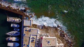 Spring 2017: Aerial bird's eye view video taken by drone from Greek island in Cyclades