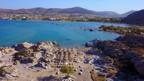 Spring 2017: Aerial bird's eye view video taken by drone of famous beach of Kolympithres, Paros island, Cyclades, Greece
