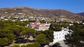 Aerial birds eye view video taken by drone of iconic Panagia Ekatodapiliani Monastery, Paros island, Cyclades, Greece
