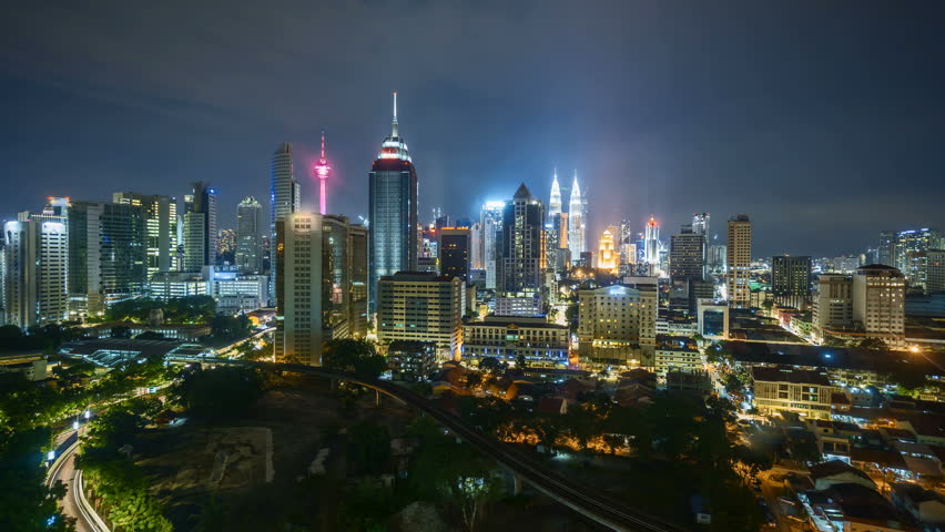 4k time lapse of cloudy sunrise night to day at Kuala Lumpur city skyline. Zoom in | Shutterstock HD Video #33317659