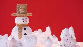 Snow man and gift box decoration on snow for new year or christmas holiday internationall. , in happy time rotation 360 degree around view in  loop able.
