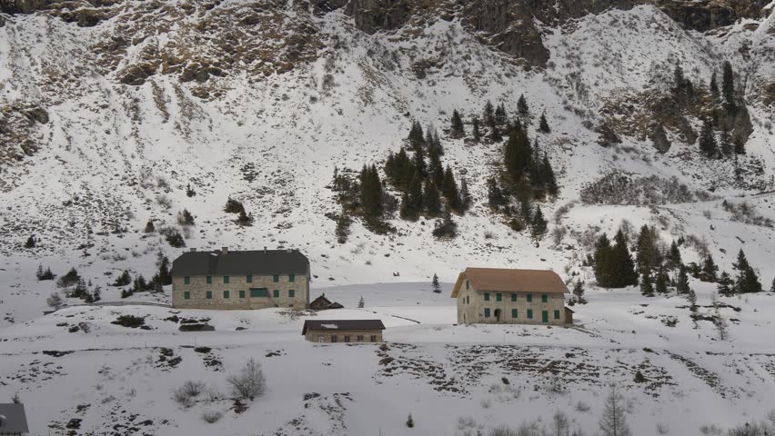 Stone houses among the rocks in winter