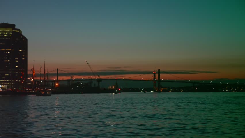 A beautiful establishing shot of Halifax Nova Scotia Canada city at night from the ocean