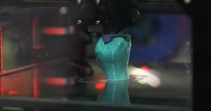 4K video footage of 3D Printing or additive manufacturing technology, close up process of three-dimensional object printing