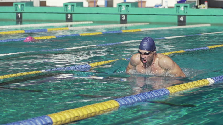 Slow Motion Of A Professional Male Swimmer Training The Breaststroke