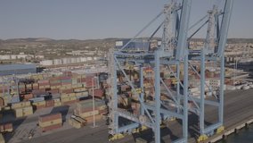 Aerial drone footage view of container Port harbor sunshine in italy // no video editing