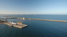 Aerial. Video from the sky, a seaport with old sailboats yachts, in Sines.