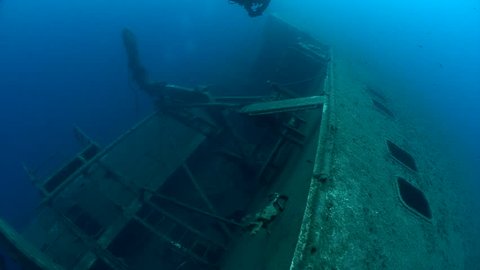 SCUBA divers exploring underwater wreck Zenobia