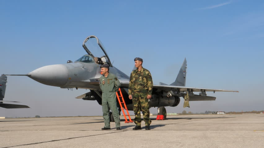 Military Fighter Jet Pilot And Specialist In Front Of Serbian Air Force Mig 29 Fulcrum Combat Aircrafts After A Flight Batajnica Air Base Belgrade Serbia 20 October 2017