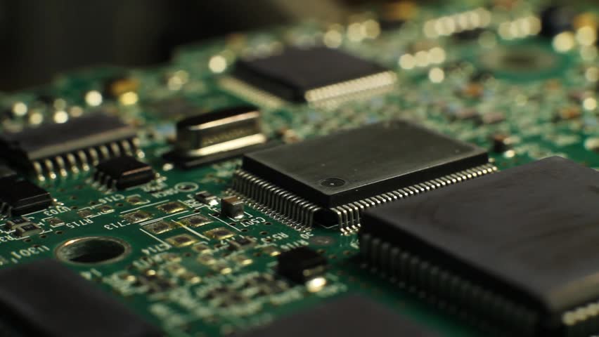 Extreme close up of a rotating circuit board Royalty-Free Stock Footage #33360766